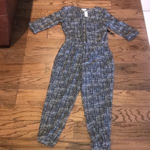 Black and cream colored romper/  size M